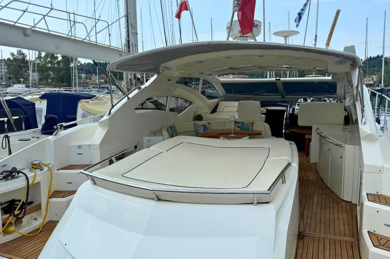  Yacht Photos Pics Luxury 2007 Absolute 56 HT yacht with spacious deck and elegant interior design.