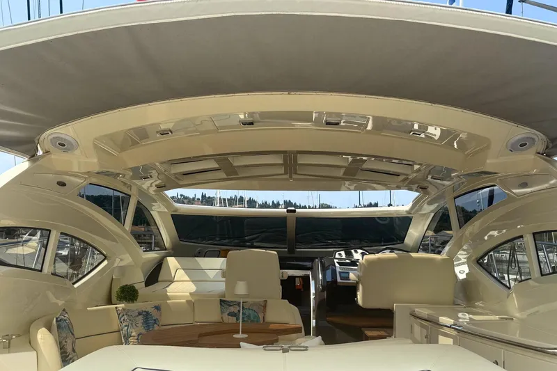  Yacht Photos Pics Luxurious interior of a 2007 Absolute 56 HT yacht with elegant seating and modern design.