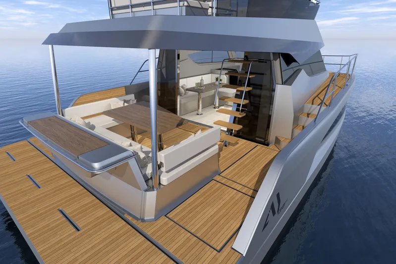  Yacht Photos Pics 2026 Aventura 38 Motor Yacht with modern deck and seating area on calm water.