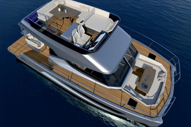  Yacht Photos Pics Aventura 38 Motor Yacht 2026 cruising on water, featuring spacious deck and modern design.