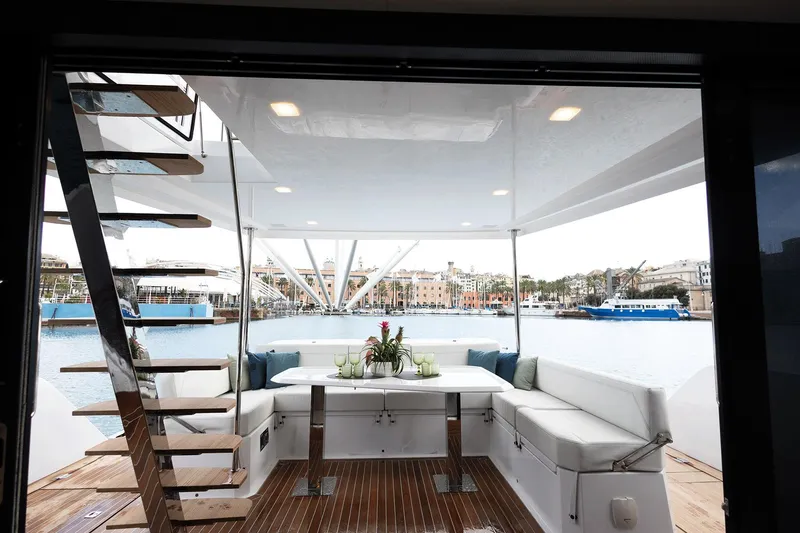  Yacht Photos Pics Luxurious 2026 Aventura 38 Motor Yacht interior with elegant seating and waterfront view.