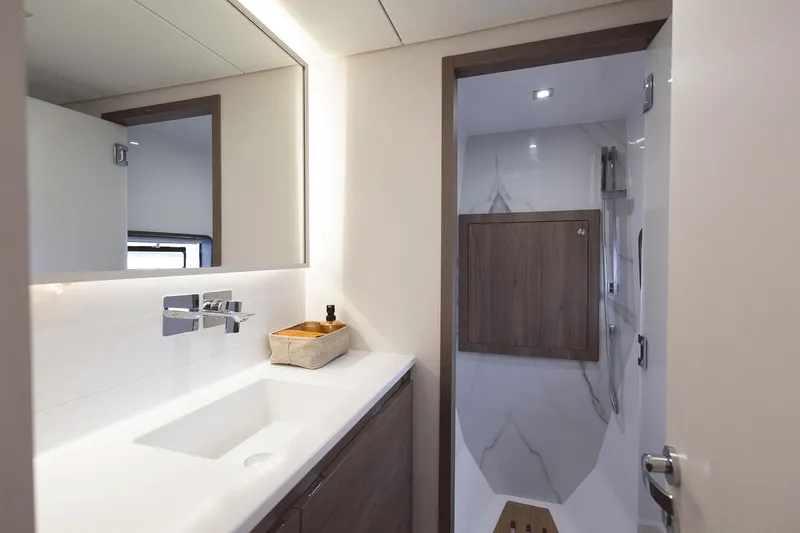  Yacht Photos Pics Luxurious bathroom in 2026 Aventura 38 Motor Yacht with modern fixtures and elegant design.