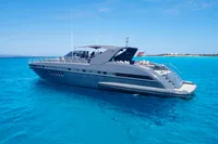 Luxury 2004 Mangusta 80 Open yacht on clear blue water.