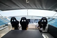 Cockpit of 2004 Mangusta 80 Open yacht with Sparco seats and control panel.