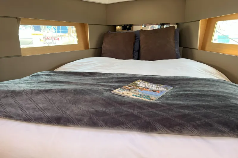 Grand Cru Yacht Photos Pics Cozy cabin interior of 2018 Beneteau Oceanis 38.1 yacht with plush bedding.