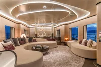 Luxurious yacht interior with modern design, featuring elegant seating and ambient lighting, 2023 Bilgin Custom.