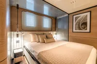 Luxurious bedroom interior in 2023 Bilgin Custom yacht, featuring elegant decor and modern lighting.