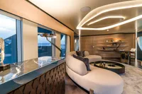 Luxurious yacht interior with modern design, featuring elegant seating and ambient lighting, Bilgin Custom 2023.