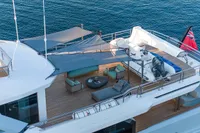 Luxurious 2023 Bilgin Custom yacht deck with seating, canopy, and ocean view.