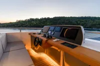 Luxurious 2023 Bilgin Custom yacht helm with modern controls and scenic water view.
