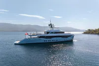 Luxurious 2023 Bilgin Custom yacht cruising on serene waters under a clear sky.