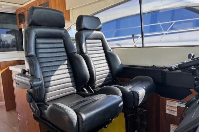 Yacht Photos Pics Interior of 2020 Riviera 4800 Sport Yacht with luxurious black leather seats.