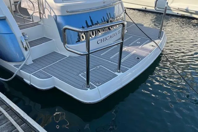  Yacht Photos Pics 2020 Riviera 4800 Sport Yacht docked in Chicago marina.