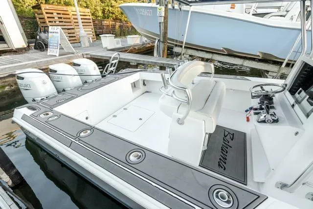  Yacht Photos Pics 2015 Bahama 34 boat with Suzuki engines docked at marina.