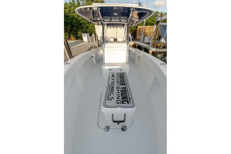  Yacht Photos Pics 2015 Bahama 34 boat interior with custom spearfishing equipment storage.