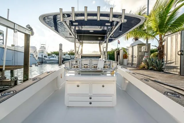  Yacht Photos Pics 2015 Bahama 34 boat docked, featuring a sleek design and spacious deck area.