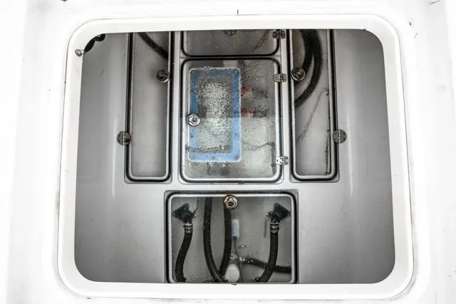  Yacht Photos Pics 2015 Bahama 34 boat compartment with visible wiring and components.