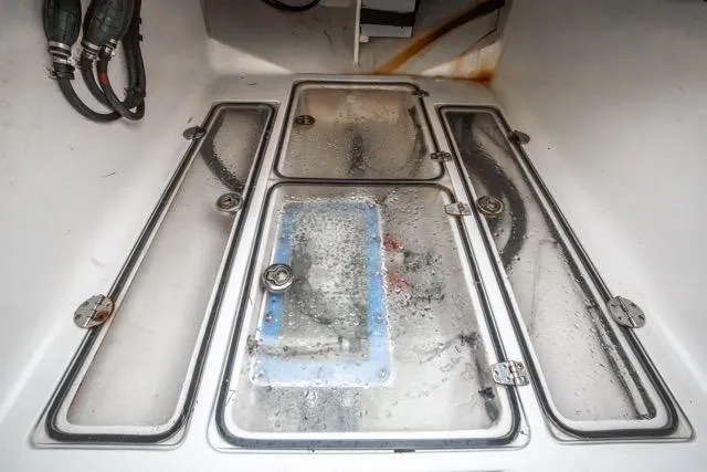  Yacht Photos Pics Bilge area of 2015 Bahama 34 boat with wet compartments and visible wiring.