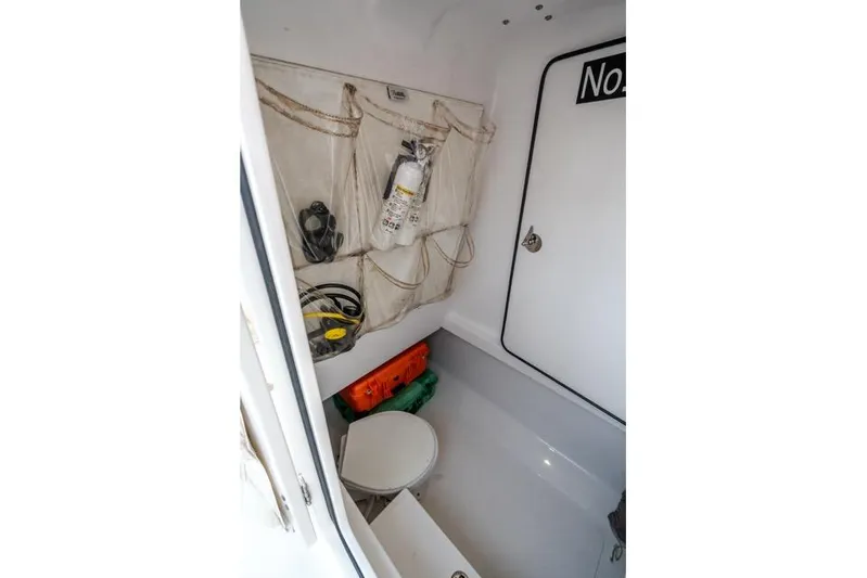  Yacht Photos Pics Interior of 2015 Bahama 34 boat with storage and safety equipment.