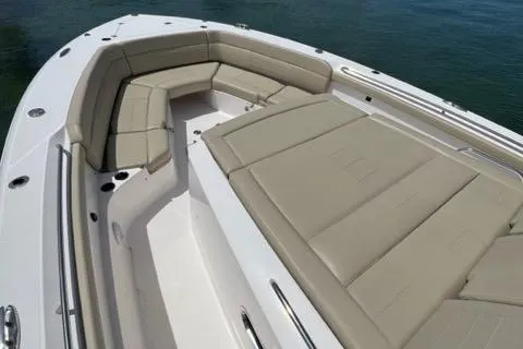  Yacht Photos Pics 2019 Pursuit S408 boat with spacious beige seating and sleek design.
