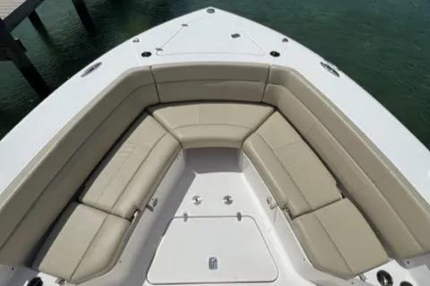  Yacht Photos Pics 2019 Pursuit S408 boat with spacious beige seating area on deck.