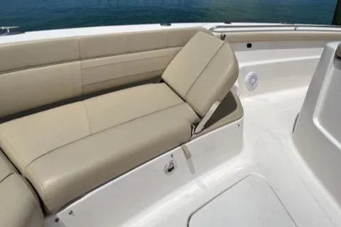  Yacht Photos Pics Luxurious seating on 2019 Pursuit S408 boat, featuring beige cushions and sleek design.