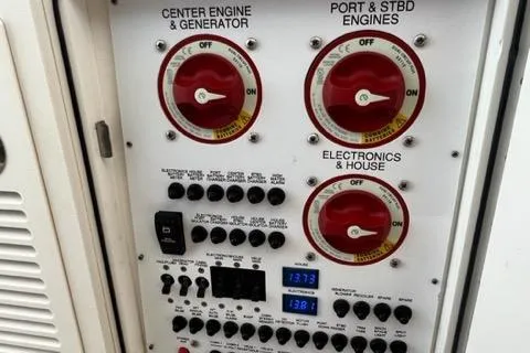  Yacht Photos Pics Control panel of a 2019 Pursuit S408 boat with engine and electronics switches.