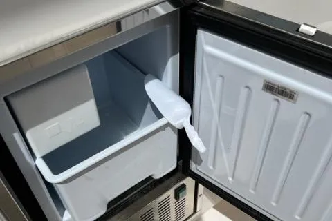  Yacht Photos Pics Open freezer compartment with ice scoop inside, Pursuit S408 model, 2019.