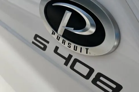  Yacht Photos Pics 2019 Pursuit S408 logo and model emblem on boat exterior.