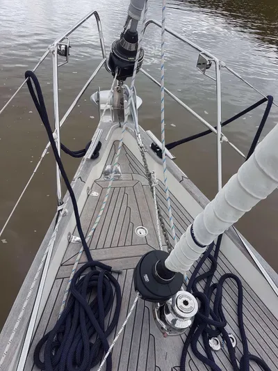 Surfing Safari Yacht Photos Pics Bow of 2010 Hallberg-Rassy 40 sailboat with ropes and winches on deck.