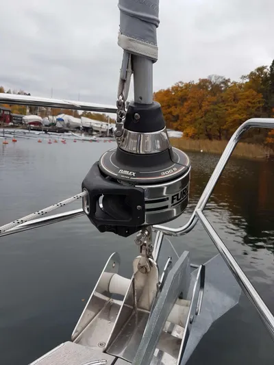 Surfing Safari Yacht Photos Pics Furlex 300S furling system on 2010 Hallberg-Rassy 40 sailboat, docked by autumn trees.