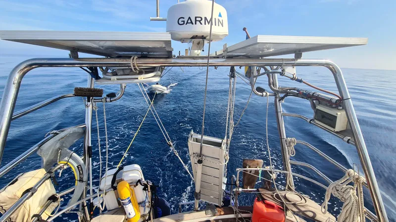 Surfing Safari Yacht Photos Pics Sailing on a 2010 Hallberg-Rassy 40 yacht with Garmin equipment, open sea view.