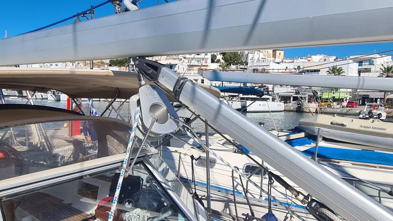 Surfing Safari Yacht Photos Pics Sailboat rigging on a 2010 Hallberg-Rassy 40, docked in a sunny marina.