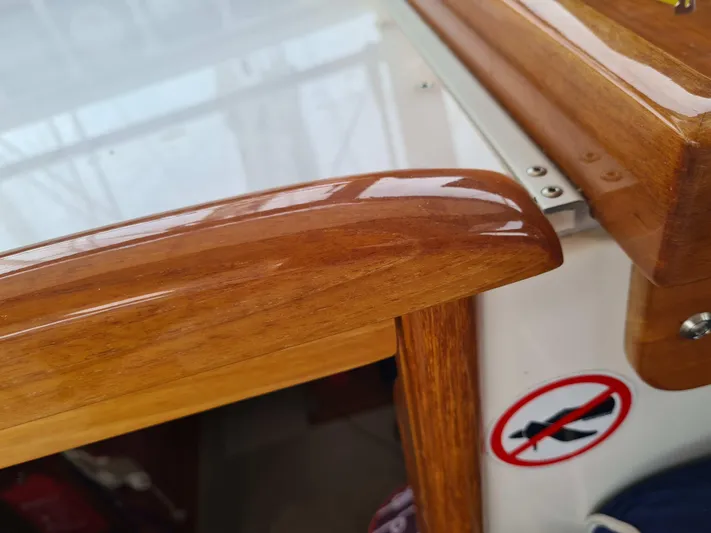 Surfing Safari Yacht Photos Pics Polished wooden interior detail of a 2010 Hallberg-Rassy 40 sailboat.