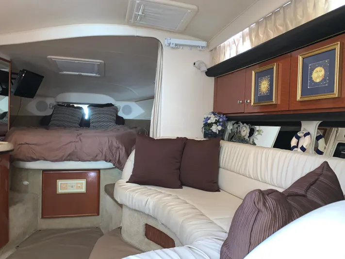 Tbd Yacht Photos Pics Interior of 2002 Sea Ray 340 Sundancer with cozy seating and elegant decor.