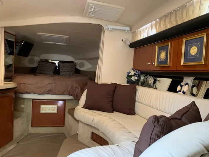 Tbd Yacht Photos Pics Interior of 2002 Sea Ray 340 Sundancer with cozy seating and elegant decor.