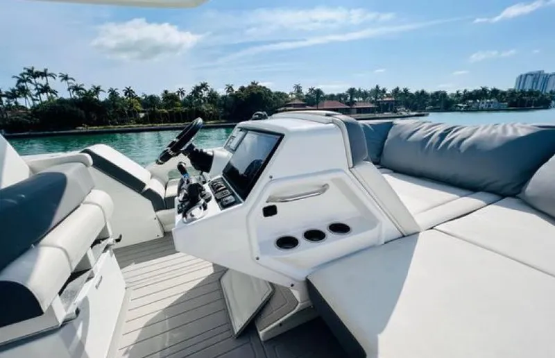 Rio Yacht Photos Pics 2017 Cruisers Yachts 60 Fly helm with luxurious seating and scenic waterfront view.