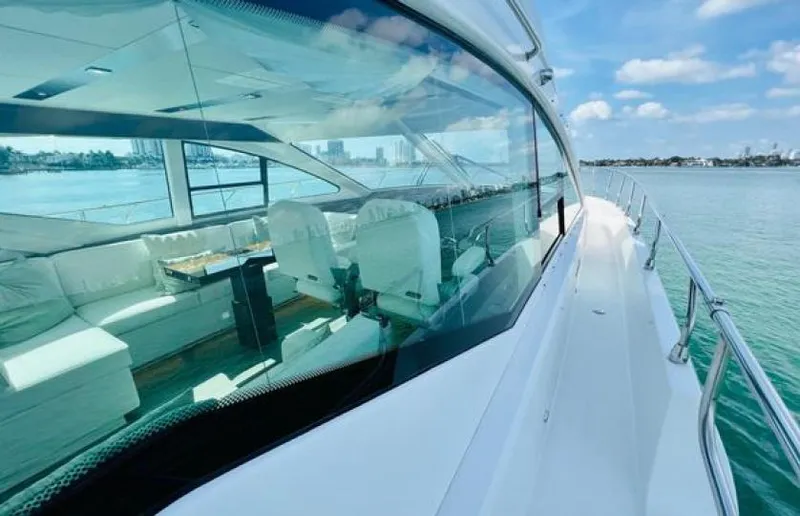 Rio Yacht Photos Pics 2017 Cruisers Yachts 60 Fly, sleek design, luxurious interior, ocean view, sunny day.