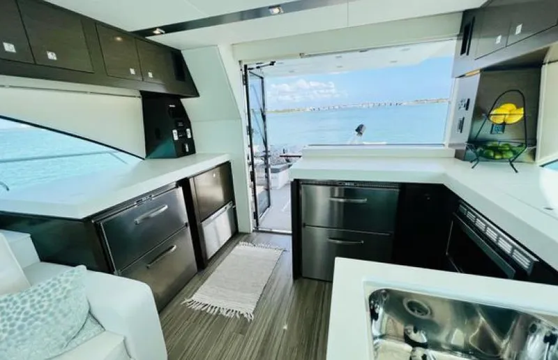 Rio Yacht Photos Pics Luxurious kitchen interior of 2017 Cruisers Yachts 60 Fly with ocean view.