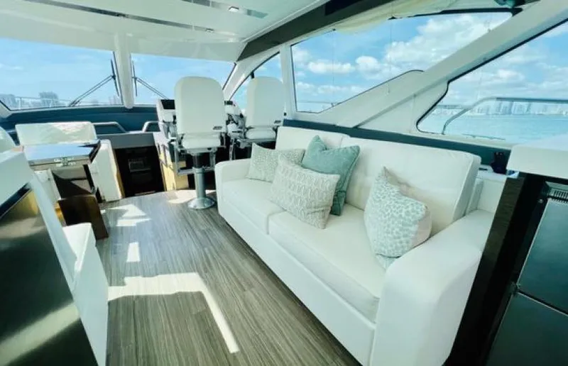 Rio Yacht Photos Pics Luxurious interior of 2017 Cruisers Yachts 60 Fly with elegant seating and panoramic windows.