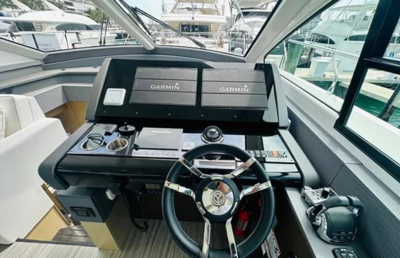 Rio Yacht Photos Pics Helm of 2017 Cruisers Yachts 60 Fly with Garmin navigation systems.