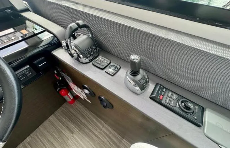 Rio Yacht Photos Pics Control panel of 2017 Cruisers Yachts 60 Fly, featuring advanced navigation and joystick controls.