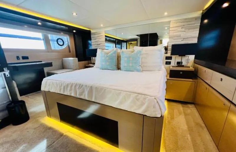 Rio Yacht Photos Pics Luxurious bedroom interior of 2017 Cruisers Yachts 60 Fly with modern decor and ambient lighting.