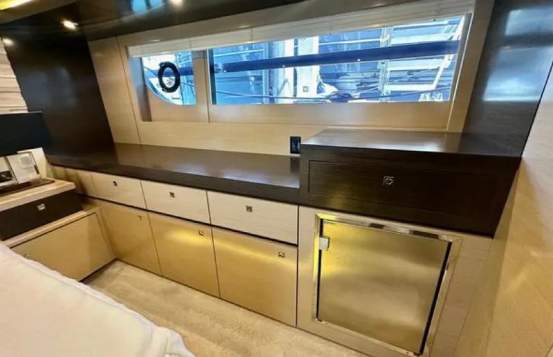 Rio Yacht Photos Pics Luxurious interior of 2017 Cruisers Yachts 60 Fly with sleek cabinetry and window view.