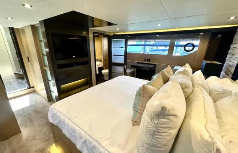 Rio Yacht Photos Pics Luxurious bedroom interior of 2017 Cruisers Yachts 60 Fly with modern amenities.