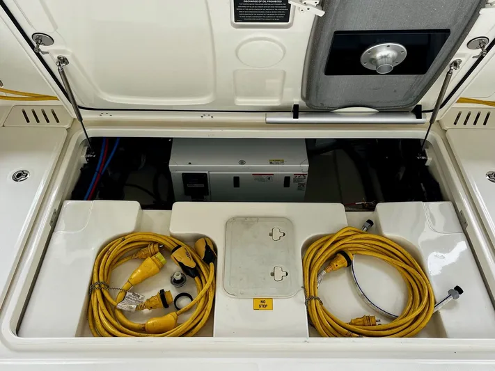 " Margin Call " Yacht Photos Pics Storage compartment in 2018 Boston Whaler 345 Conquest with cables.
