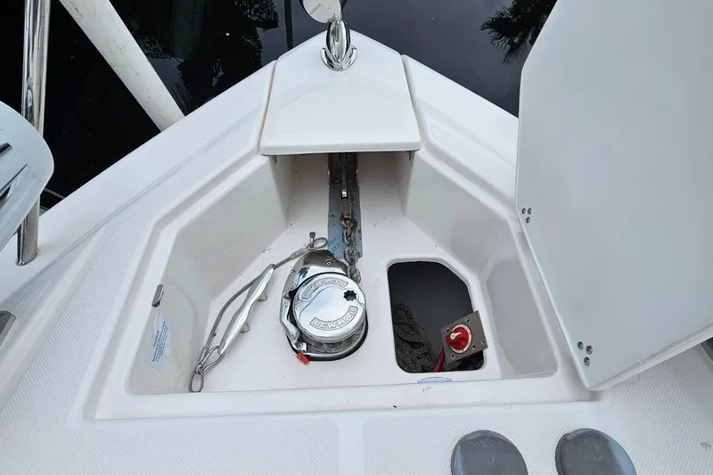  Yacht Photos Pics Anchor compartment of 2022 Regal 33 XO boat with chain and winch.