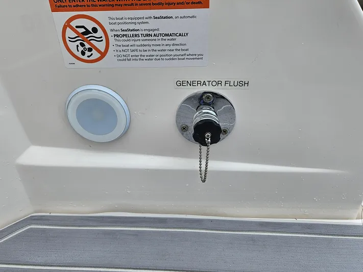  Yacht Photos Pics Regal 33 XO 2022 boat generator flush and safety warning label.