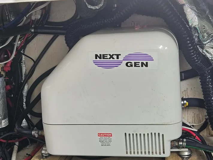  Yacht Photos Pics Next Gen generator in 2022 Regal 33 XO boat engine compartment.