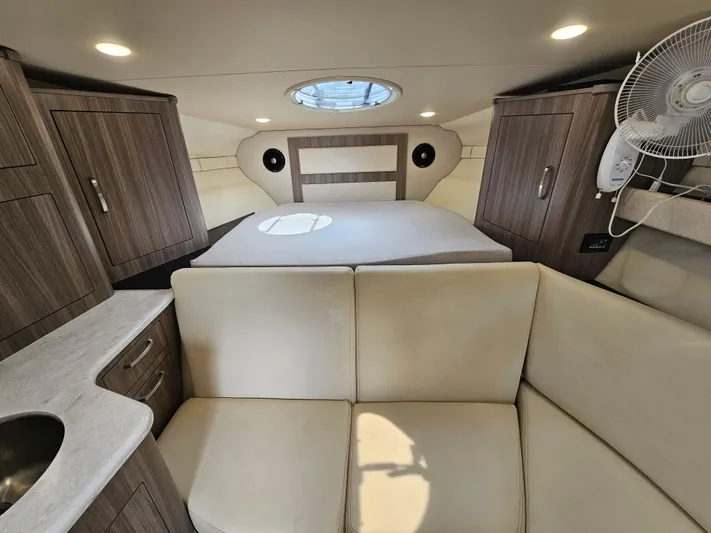  Yacht Photos Pics Interior of 2022 Regal 33 XO yacht with modern furnishings and natural light.